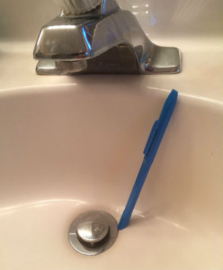 Clean bathroom drains with Scrigit