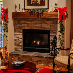 fireplace with logs burning